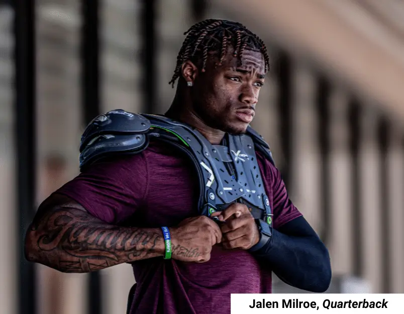 Football player in XTECH pads showing low-profile upper body fit
