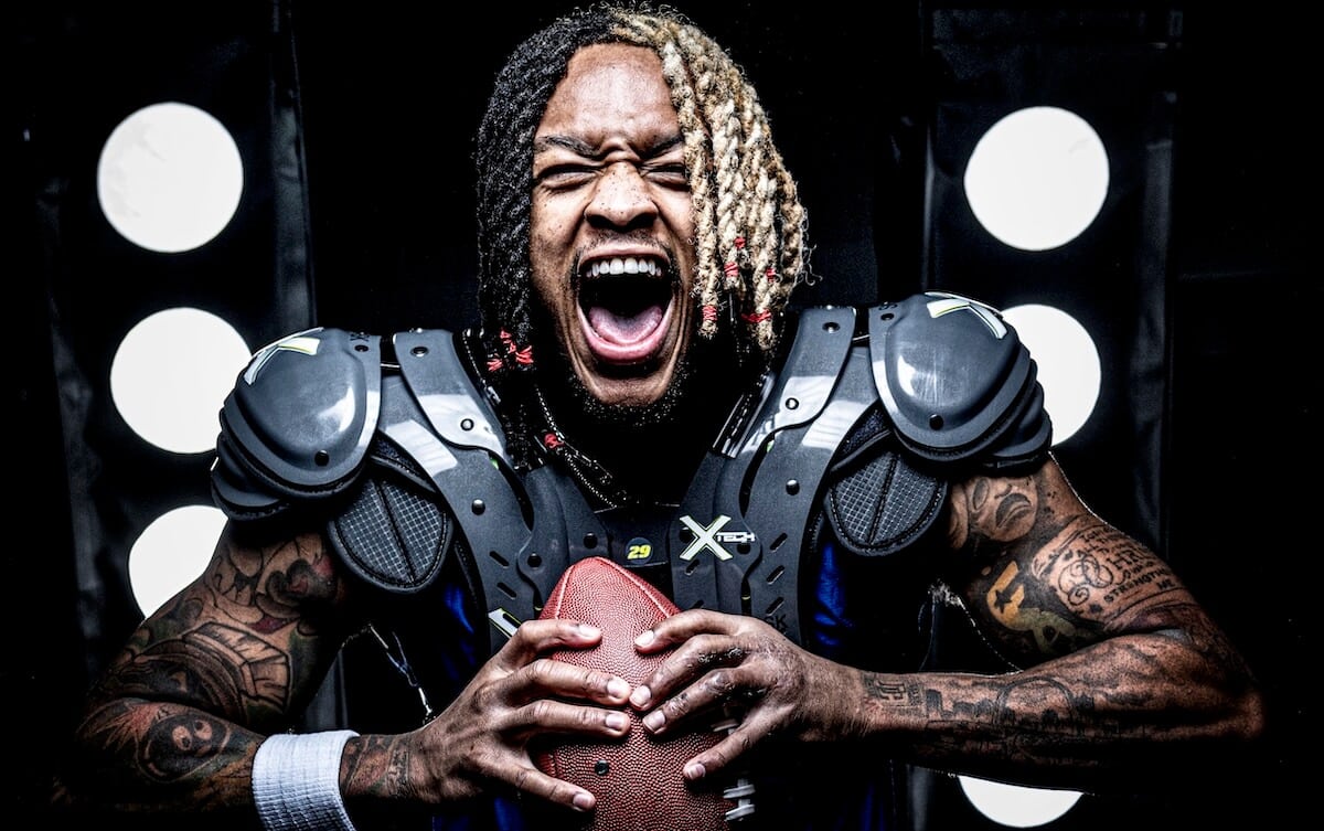 Low-profile shoulder pad option for wide receivers and defensive backs