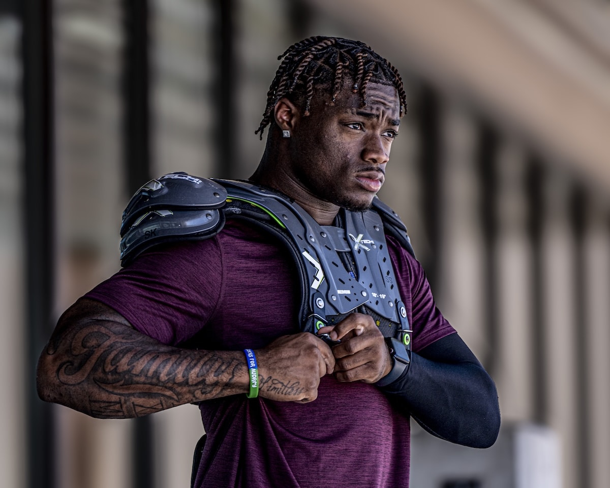 Jalen Milroe wearing XTECH football shoulder pads.